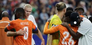 Ivory Coast's midfielder #08 Franck Kessie (L) is comforted by Norway's forward #09 Erling Braut Haaland (2ndL) at the end of the 2026 World Cup round of 32 football match between Ivory Coast and Norway at the Dallas Stadium in Arlington on June 30, 2026. (AFP Photo)